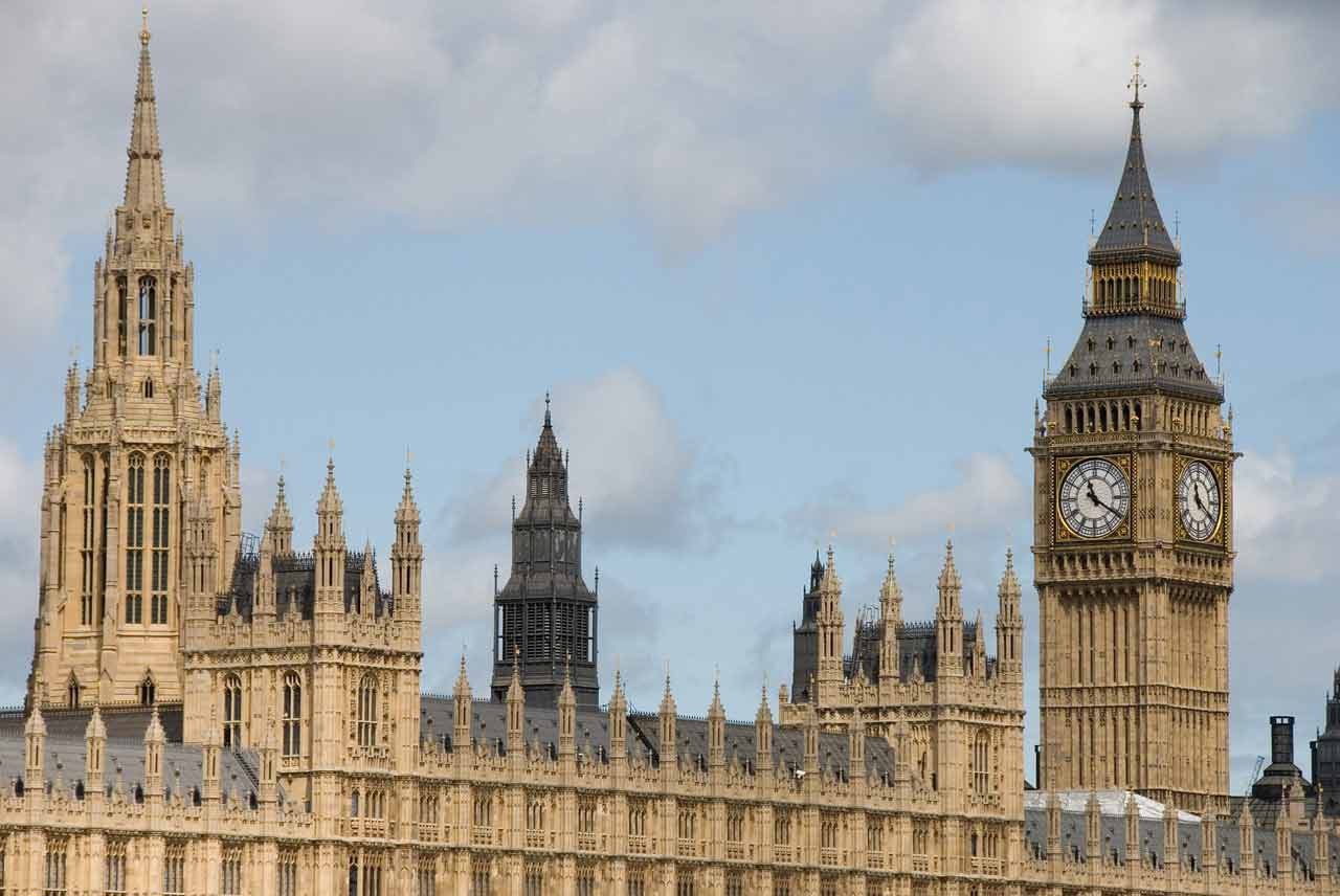 Big Ben clock tower and the central tower rise above Westminster Palace in London