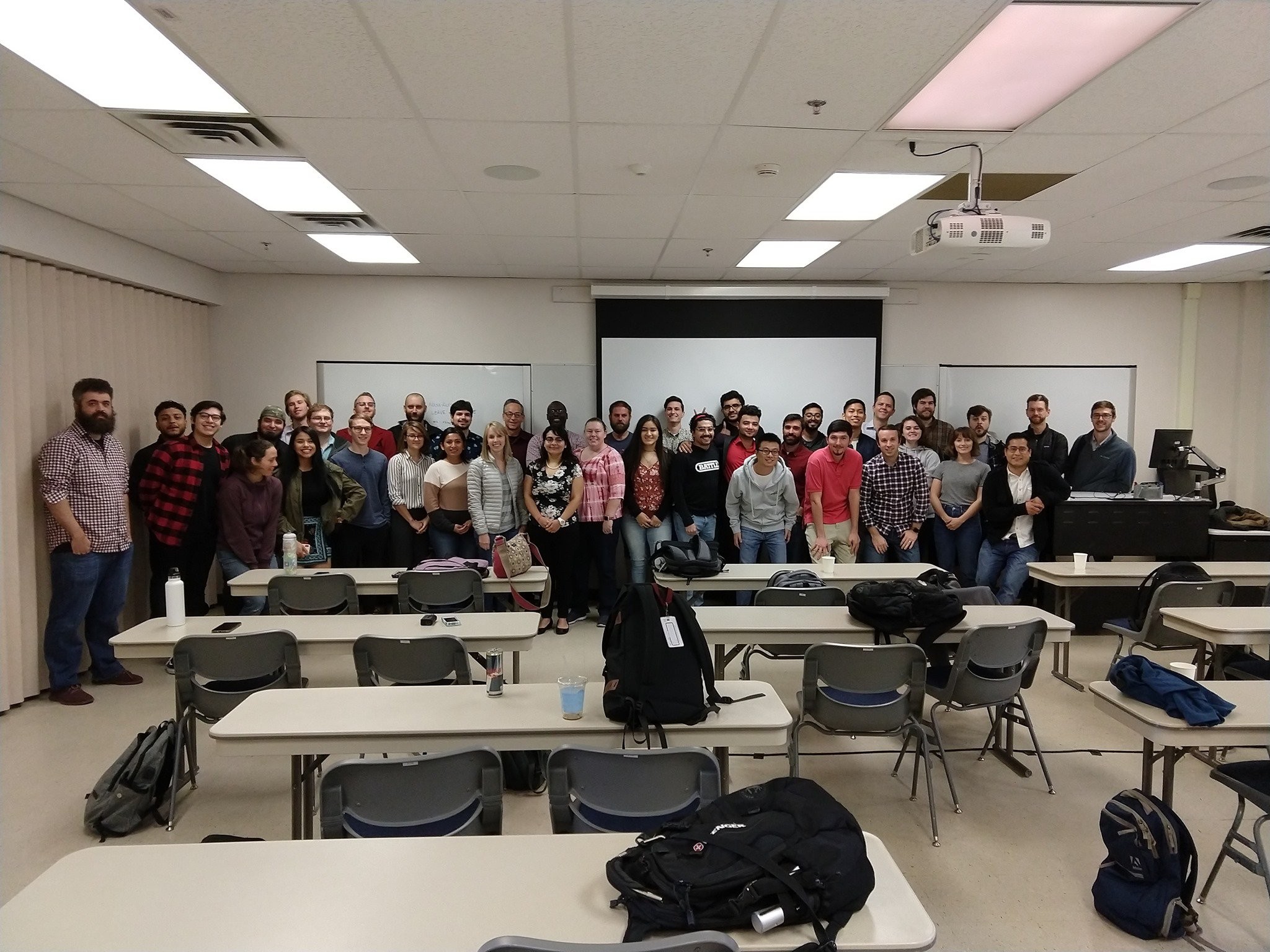 Group of students at the UT Austin boot camp in a classroom